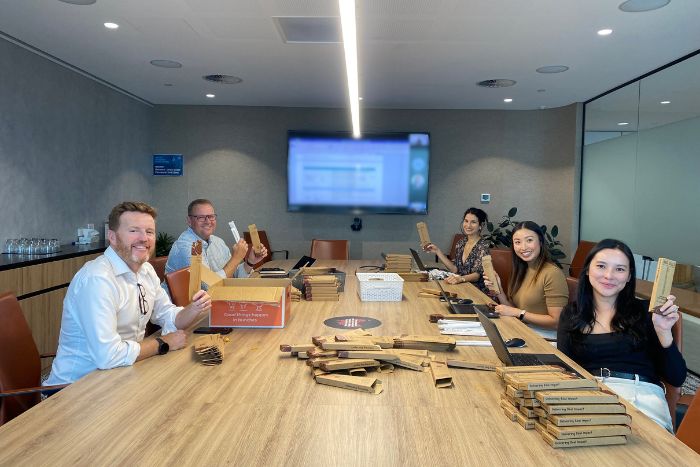 Urbis volunteer team with Red Dust Bamboo Toothbrush