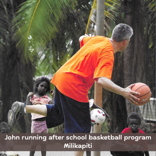 John running afterschool basketball clinic