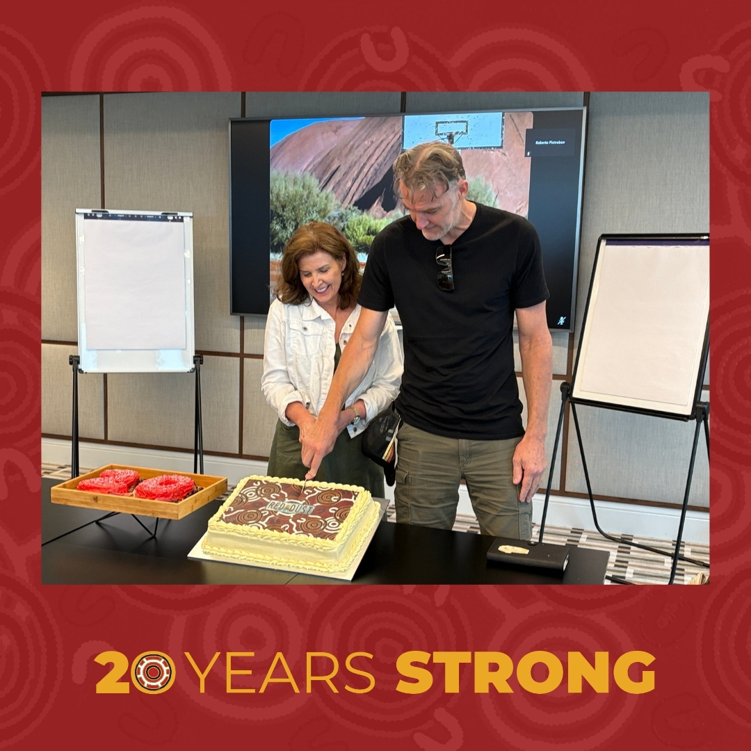 Walking Backwards Into Our Future 20 Years Strong cake cutting with Jen and Wheeler